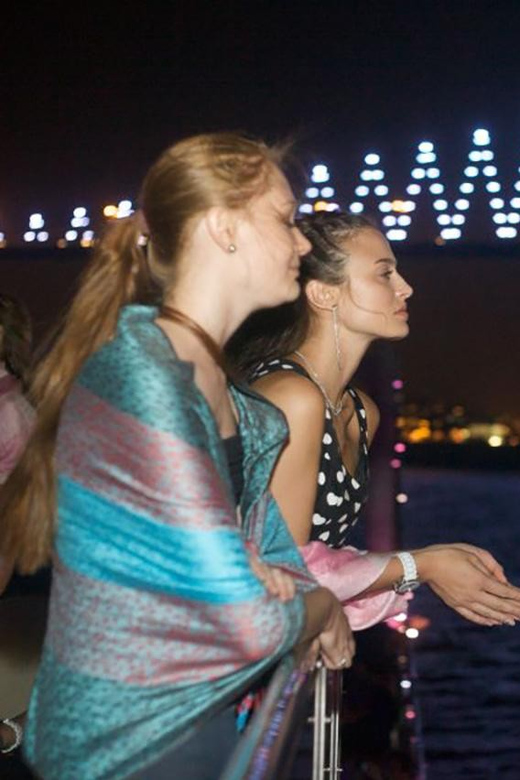 Istanbul: Bosphorus Night Dinner Cruise with Private Table - Under the Bosphorus Bridge