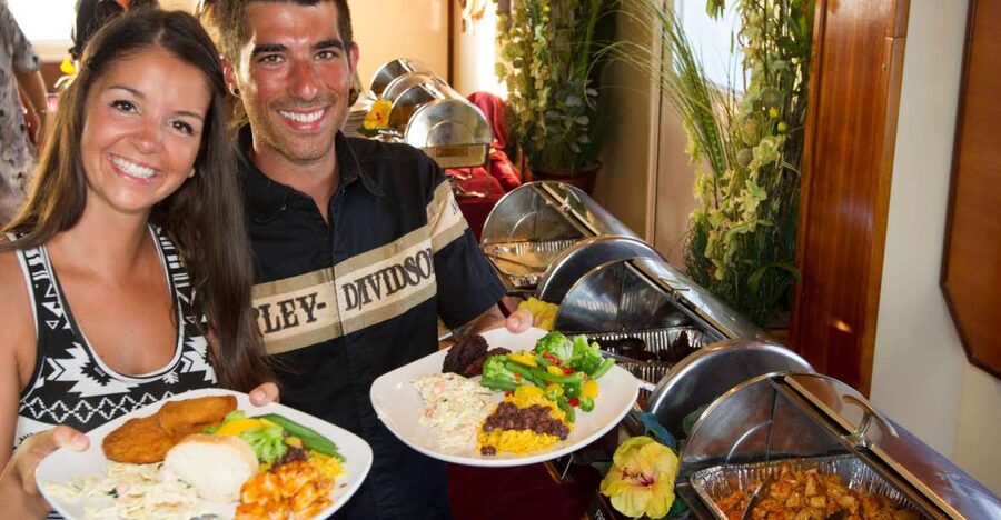 Key West: Sunset Dinner Cruise with Open Bar & Live Music - Boarding The Party Cat at William Street