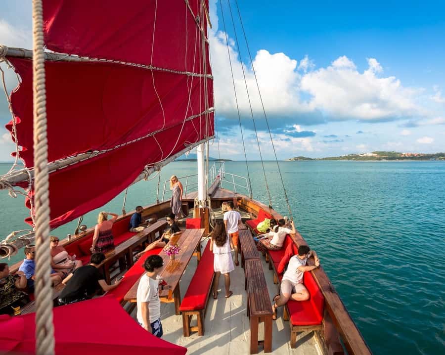 Koh Samui: Red Baron Romantic Sunset Dinner Cruise - Passing Cheong Mon Beach before sunset