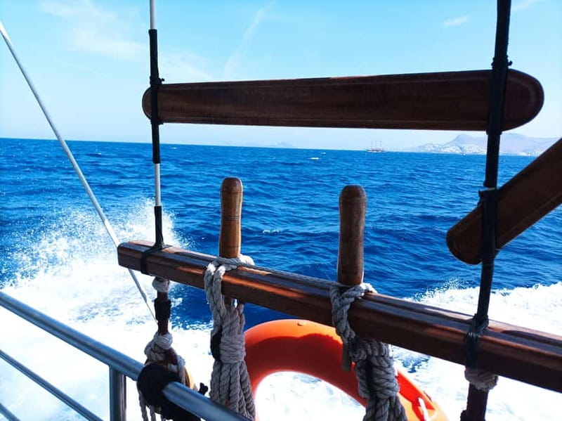 Kos: 3-Island Cruise with Lunch and Hotel Transfer - Lunch, swimming, and possible dolphins