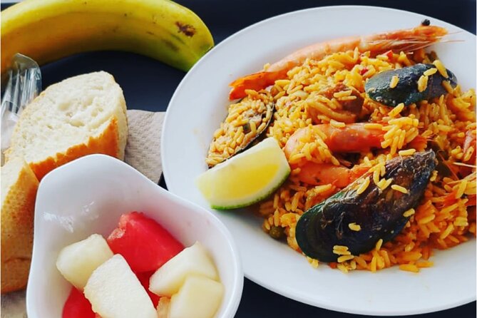 Lanzarote: La Graciosa island cruise with lunch and water activities - Paella, sangria, and the practical food details