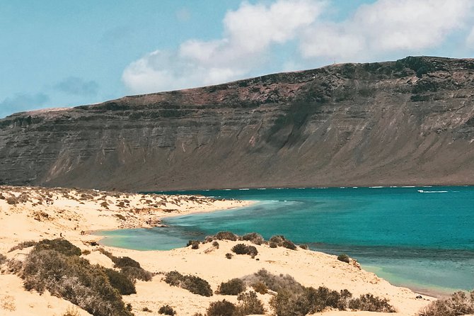 Lanzarote: La Graciosa island cruise with lunch and water activities - Kayaking, snorkelling, and swimming from the boat