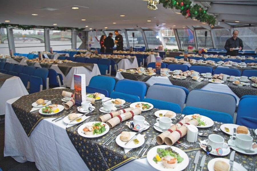 London: Christmas Party Lunch Cruise - A Christmas party with London moving past the windows