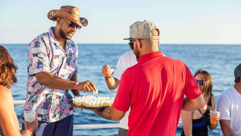 Los Cabos: Sunset Dinner Cruise with Transportation - Taco buffet, open bar, and music on the water