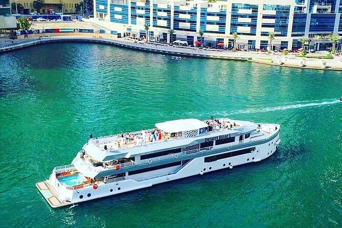 Luxury 7 Star Mega Yacht Dinner Cruise With international Buffet - Boarding at Marina Mall requires a little care