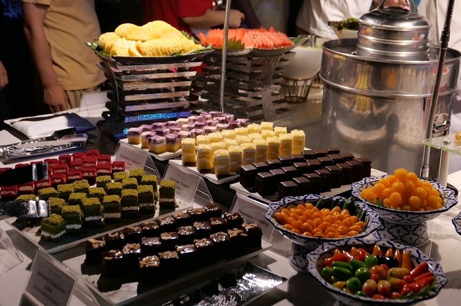 Luxury Dinner Cruise with Guide and Transfer (Opt. Executive Van) - Wat Arun after dark