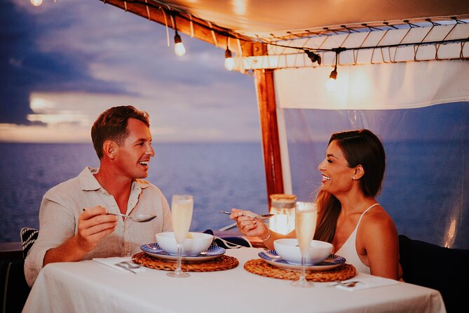 Luxury Four-Course Caribbean Dinner Cruise Experience - Sunset from Pelican Pier in Noord