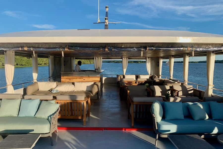 Luxury Sunset Dinner Cruise with 4-Course Meal - Cruising upstream as the afternoon fades