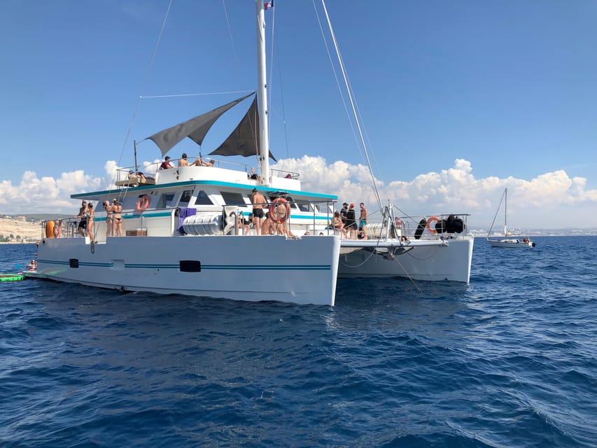 Marseille: Frioul Archipelago Catamaran Cruise with Lunch - Swimming in clear Mediterranean water