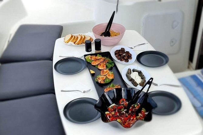 Morning and Sunset Cruise with Meal and Transport Included - A Greek meal served on board