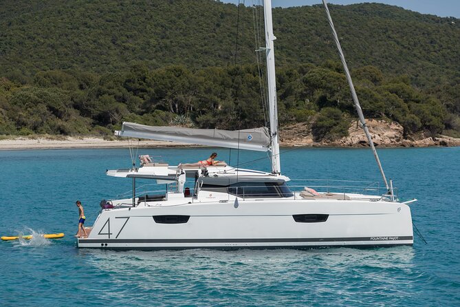 Mykonos: Brand-New Catamaran Cruise with Meal, Drinks & Transport - Choosing between Rhenia and the southern coast