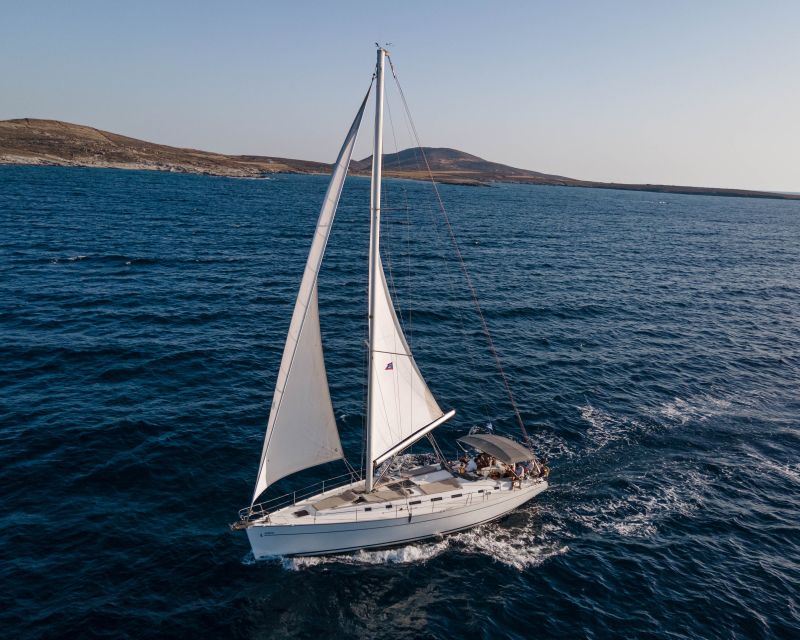 Mykonos: Delos & Rhenia Boat Cruise with Lunch & Transfer - From Tourlos Marina to the sacred island of Delos
