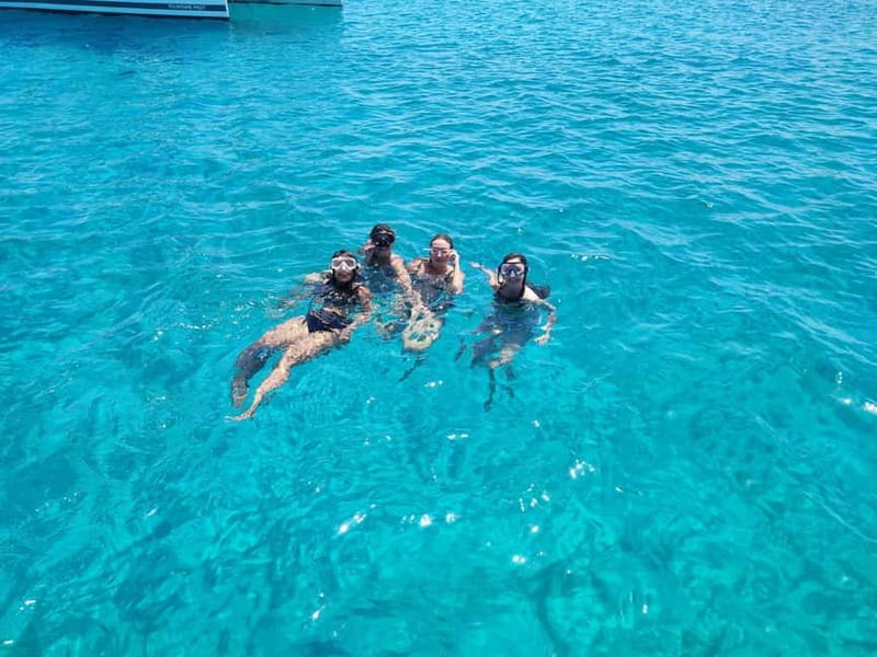 Mykonos: Sunset Cruise with a Buffet of Greek Delicacies - The First Hour: Sailing Toward Ancient Delos