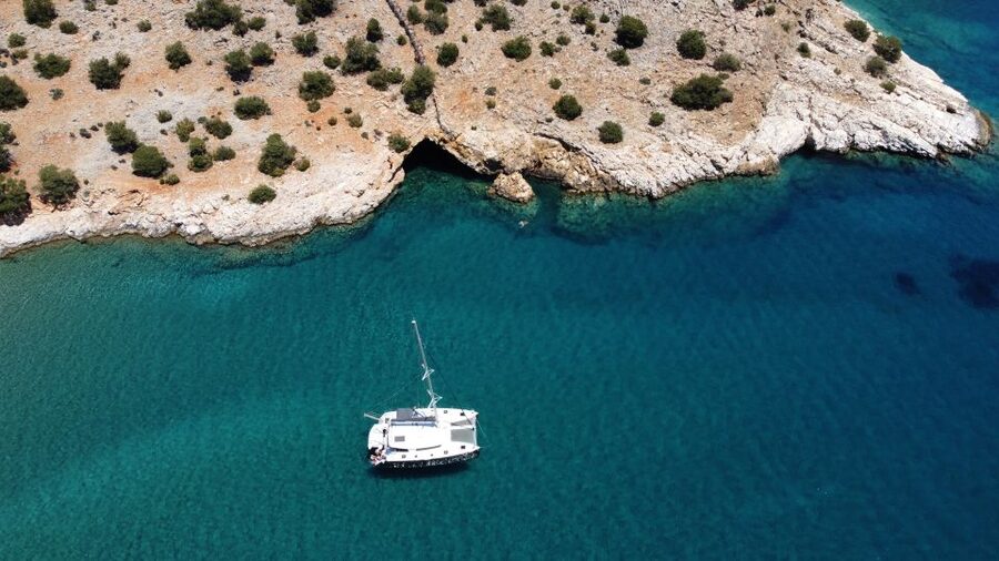 Naxos: Catamaran Cruise with Lunch & Drinks - Swimming in clear Aegean water