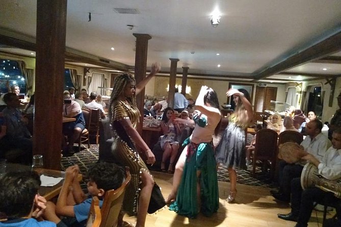 night-tour Nile dinner cruise with open buffet and belly dancer - Cairo from the river after dark
