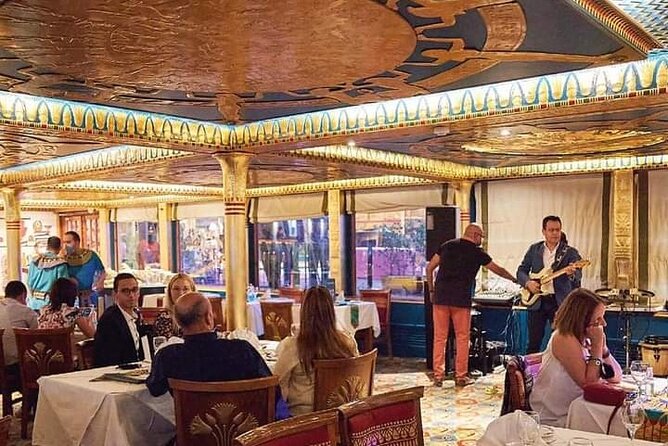 Nile Dinner Cruise 5 stars with show and belly dancer - Boarding the Nile after dark