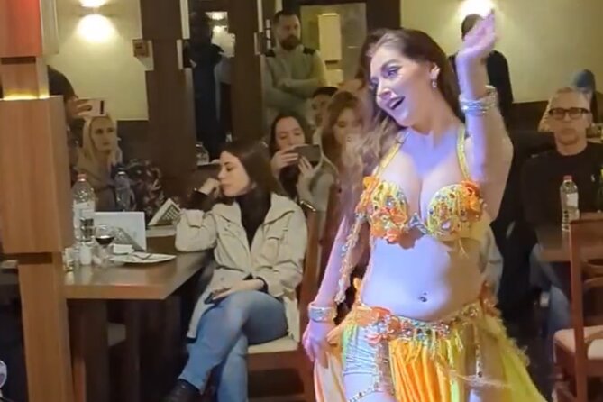 Nile Dinner Cruise in Cairo With Belly Dancing and Transfer - Taking in Cairo from the open deck