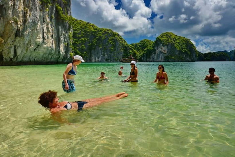 Ninh Binh: Halong Bay Day Cruise With Meal & Drop in Hanoi - The sunset party and return to Hanoi