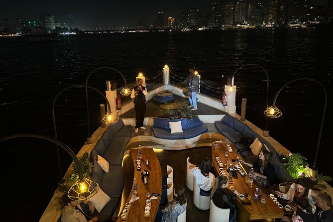 Open Air Nile Dinner Cruise with Sunset or Night Vibes - Passing the Cairo Opera House and Qasr El Nil Bridge