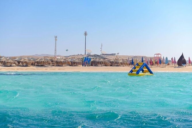 Paradise Island Snorkeling Cruise with Lunch from Hurghada - Snorkeling around coral and shallow water