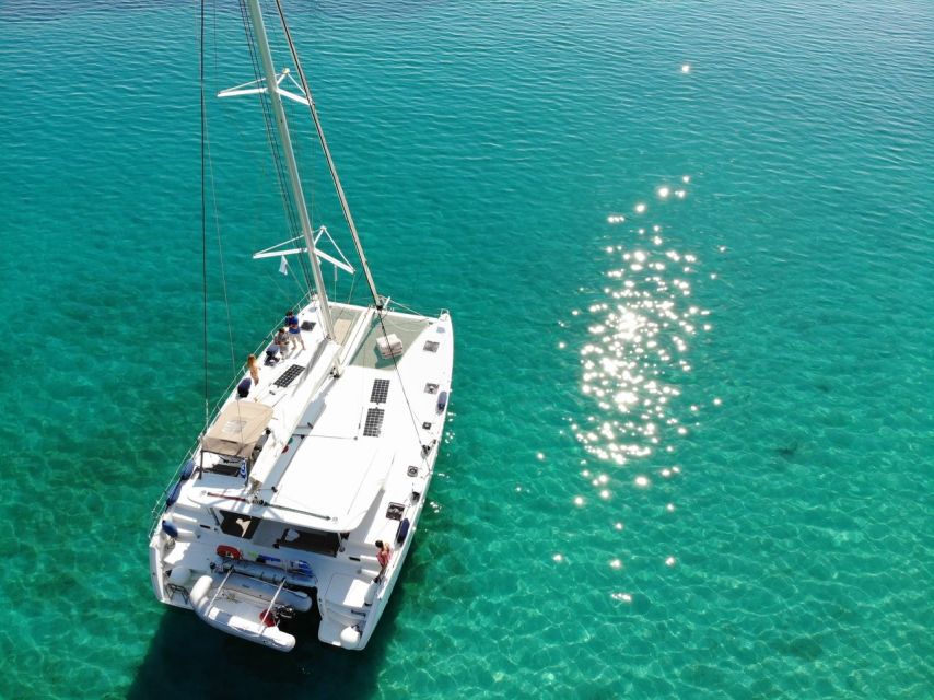 Paros: Private Catamaran Cruise with Lunch, Drinks & SUP - Greek lunch served at sea