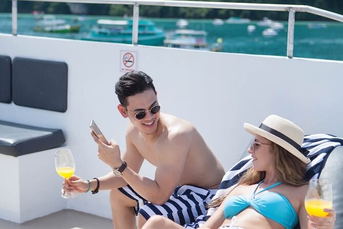 Phi Phi Islands Cruise with Lunch & Sea View Seats from Phuket - Snorkeling at Coral Bay