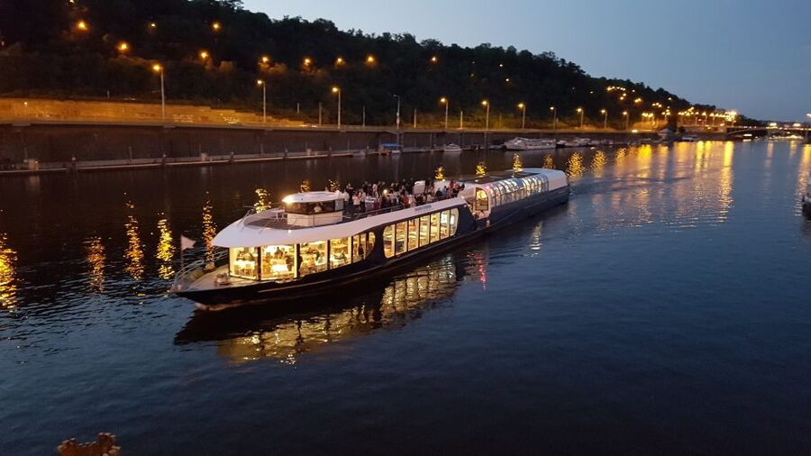 Prague: City Tour and Dinner Cruise with Hotel Pickup - Boarding the Vltava dinner cruise