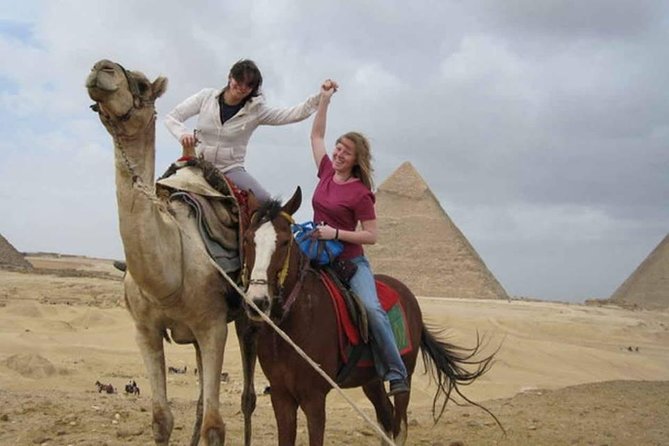 Private Guided Day Tour: Giza Pyramids, Egyptian Museum and Nile Dinner Cruise - Giza Pyramids and Sphinx: the powerful first stop