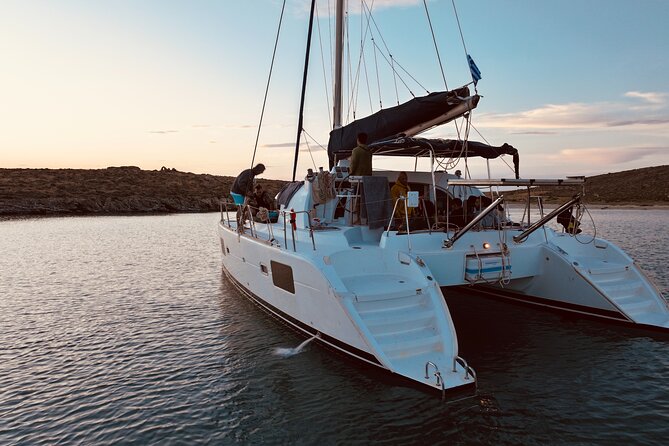 Private Mykonos Catamaran Day Cruise with Meals & Water Toys - Rineia and the swim stops