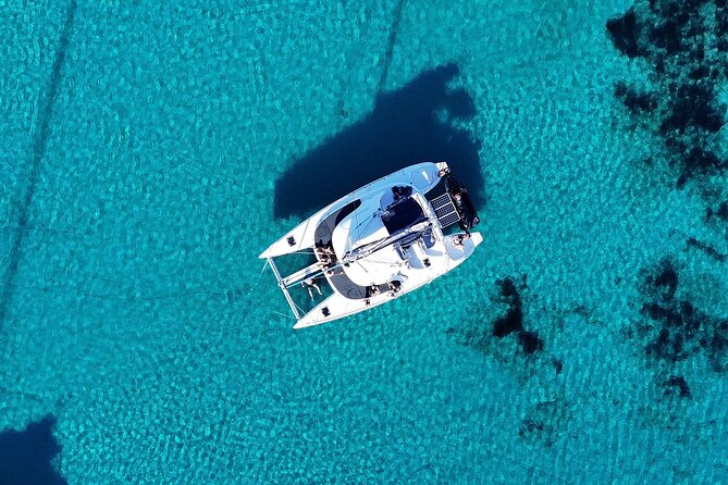 Private Mykonos Catamaran Day Cruise with Meals & Water Toys - Ornos and the protected southern route