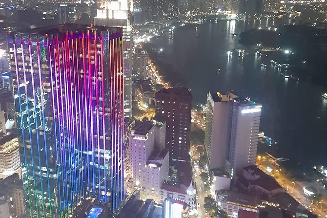 Private Saigon by night at Bitexco & Dinner Cruise - Starting at 6pm with a private motorbike pickup