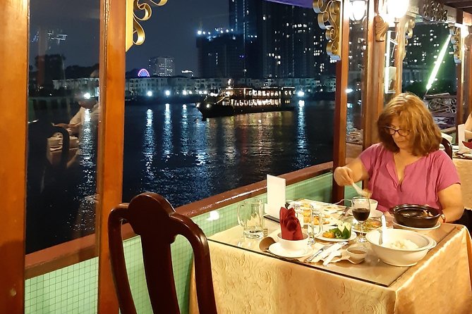 Private Saigon by night at Bitexco & Dinner Cruise - Dinner, iced tea, and city lights on the river