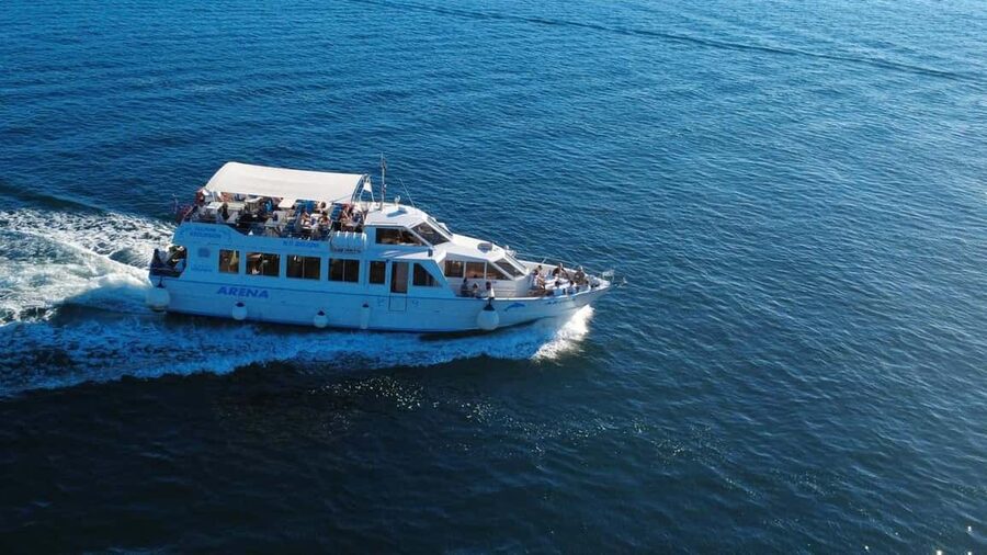 Pula: Brijuni Dolphins Sunset Cruise with Dinner and Drinks - Leaving Pula aboard the Arena boat