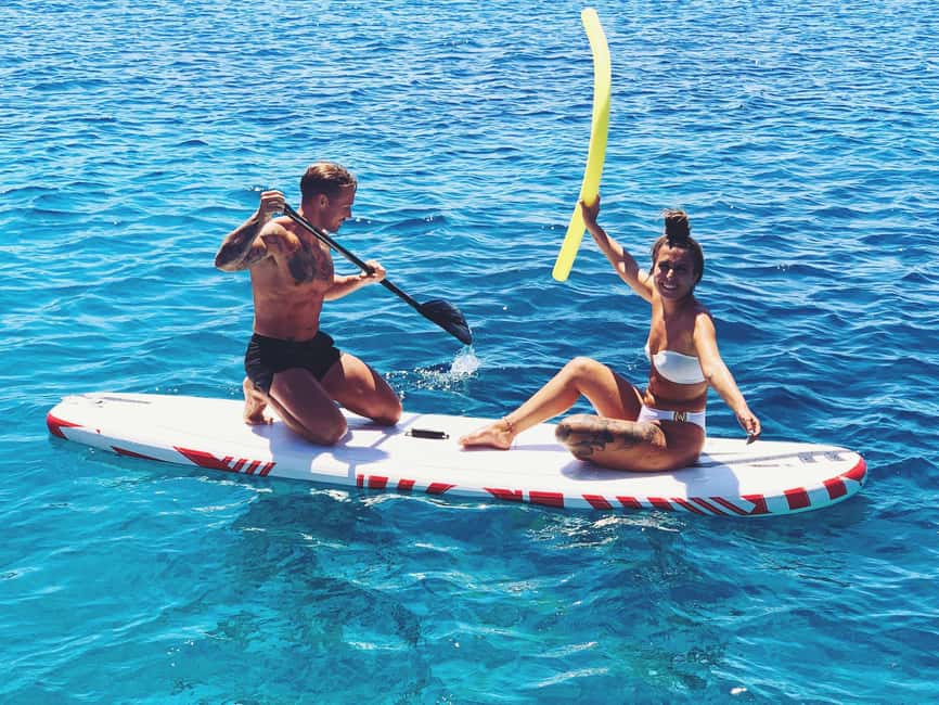 Rethymno: Sailing Catamaran Cruise with Meal & Drinks - Sun, shade, and comfort aboard