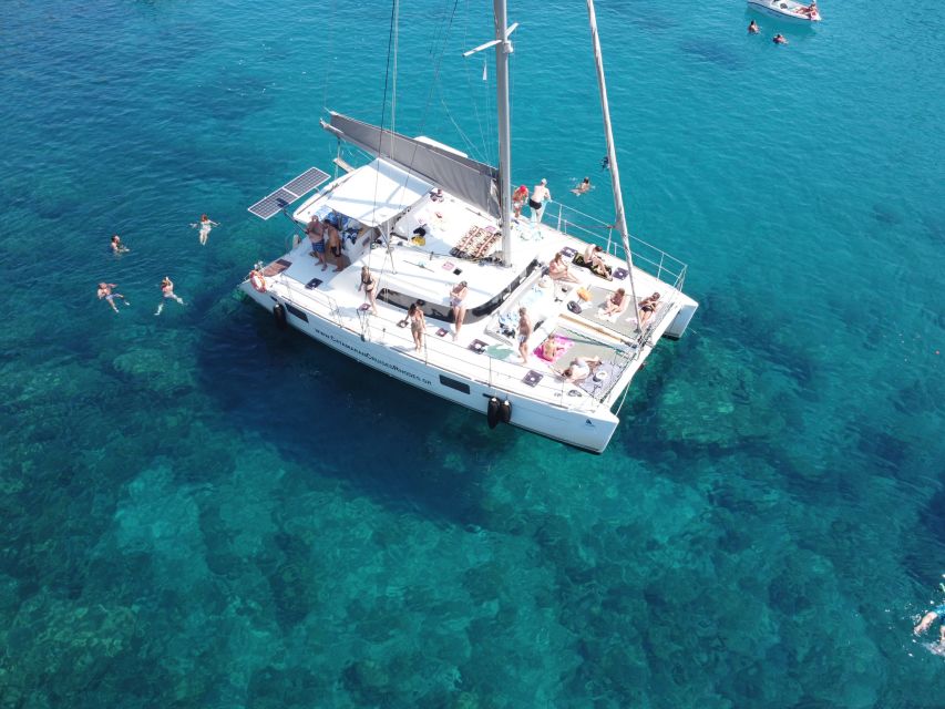 Rhodes: All-Inclusive Catamaran Cruise with Lunch and Drinks - Lunch onboard, with Greek flavors instead of a packed sandwich