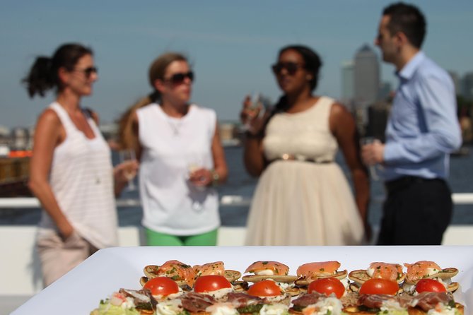 River Thames Evening Cruise with Sparkling wine and Canapés - Boarding at Tower Pier near the Tower of London