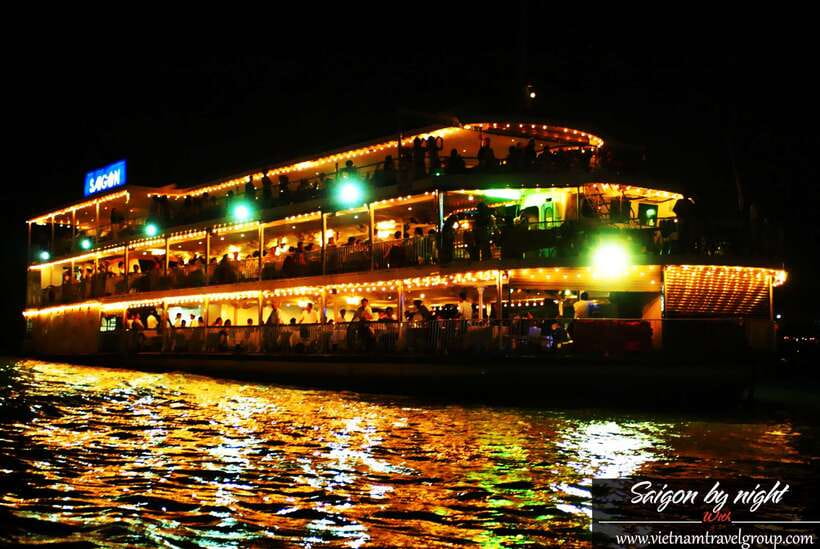Saigon by Night: Traditional Dinner Cruise - Crossing the city to Bach Dang Port