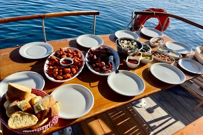 Santorini Caldera Day Traditional Cruise with Meal and Drinks - Black Mountain, Indian Rock, and Mesa Pigadia