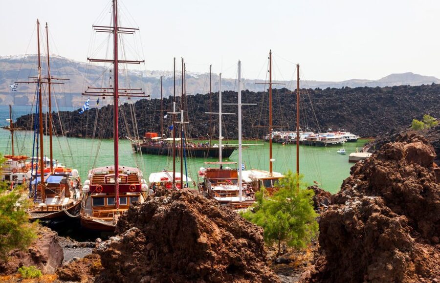 Santorini Caldera: Sunset Cruise with Dinner - Watching the sunset from Oia