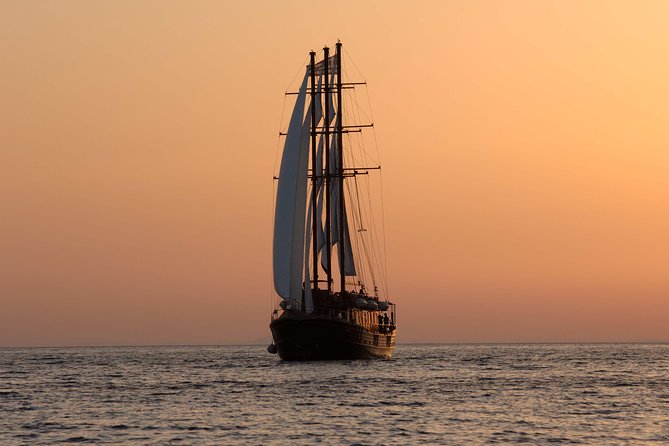 Santorini Caldera Sunset Sailing Cruise with Dinner and Wine - Dinner near Thirassia Bay