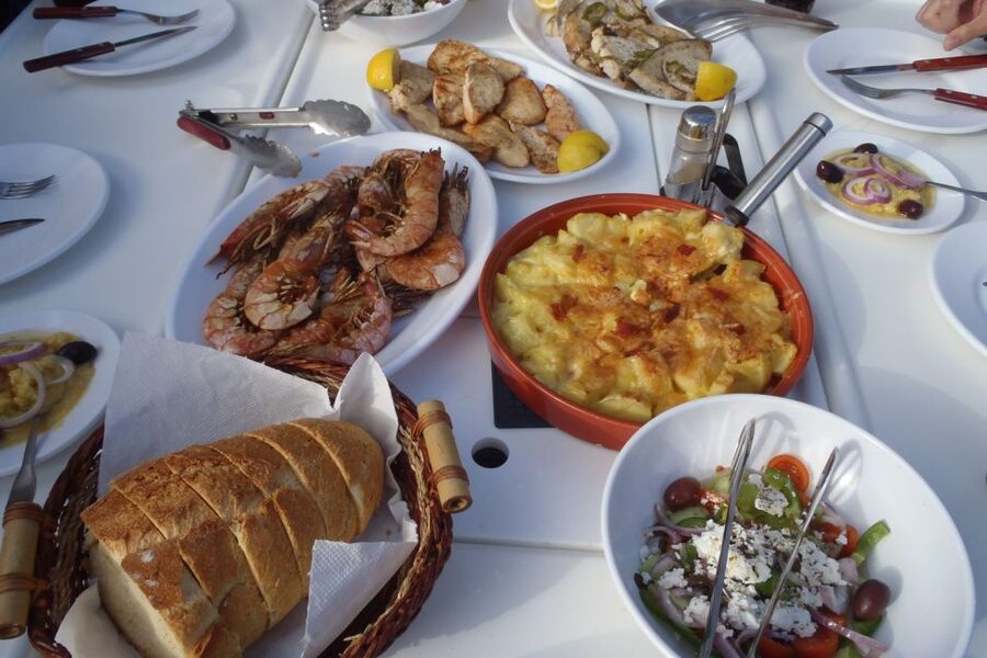 Santorini Caldera: Sunset Sailing Cruise with Meal - Palea Kameni, hot water, and volcanic rock