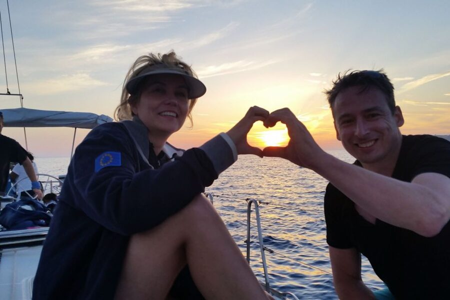Santorini Caldera: Sunset Sailing Cruise with Meal - Sunset on the way back to Vlychada