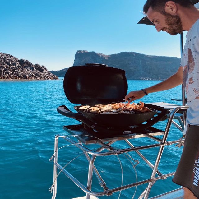 Santorini: Catamaran Cruise with Lunch, Drinks, & Oia Visit - Santorini Volcano, Indian Rocks, and the caldera cliffs