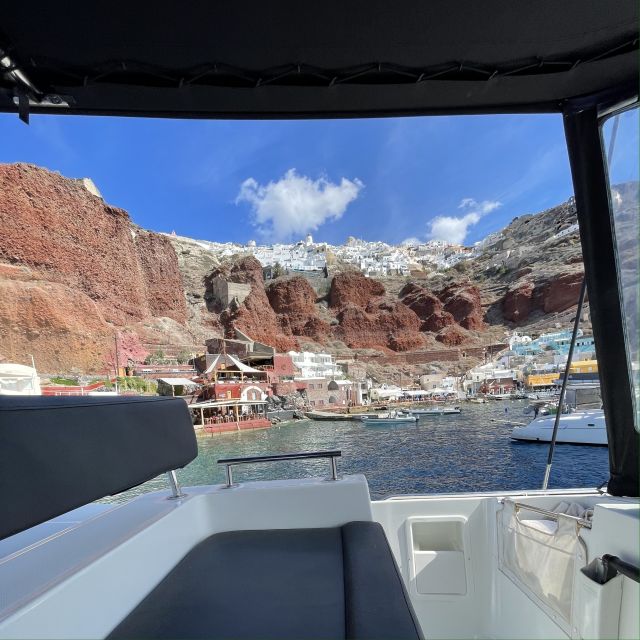 Santorini: Catamaran Cruise with Lunch, Drinks, & Oia Visit - Akrotiri Lighthouse and the two famous beaches