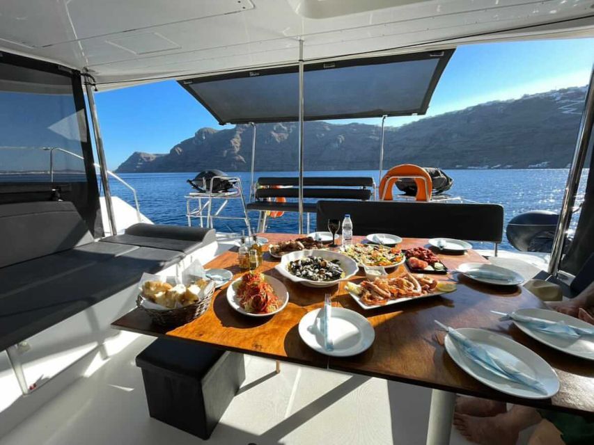 Santorini: Catamaran Cruise with Lunch, Drinks, & Oia Visit - What the crew adds to the day