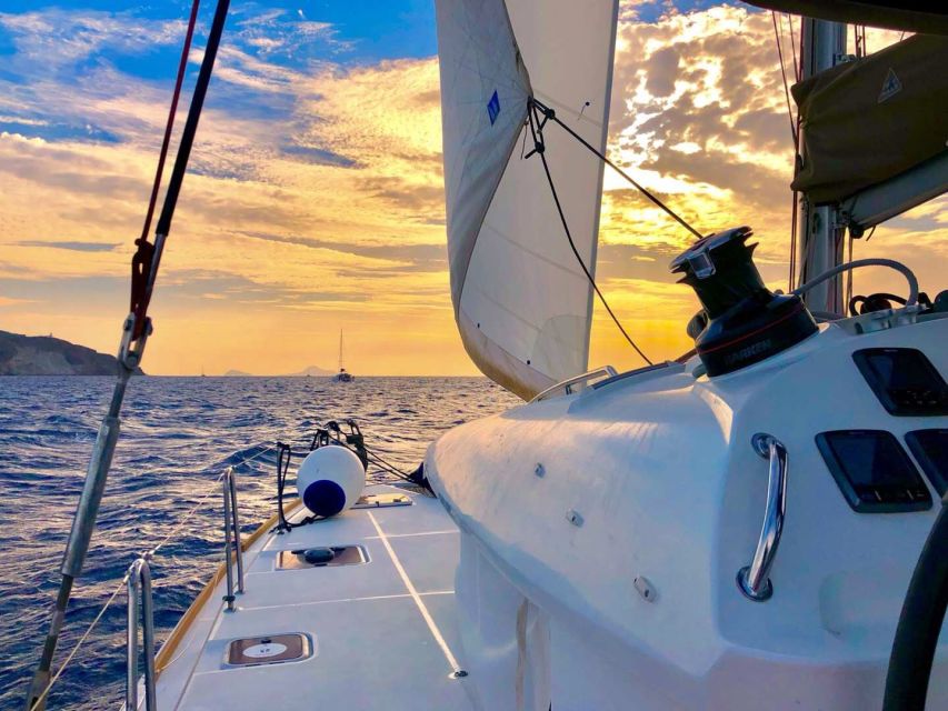 Santorini: Catamaran Cruise with Lunch, Drinks, & Oia Visit - From hotel pickup to Oia’s cliffs