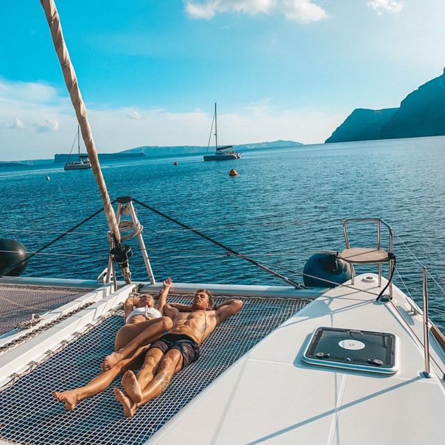 Santorini: Catamaran Cruise with Meal & Open Bar - Swimming at the hot springs