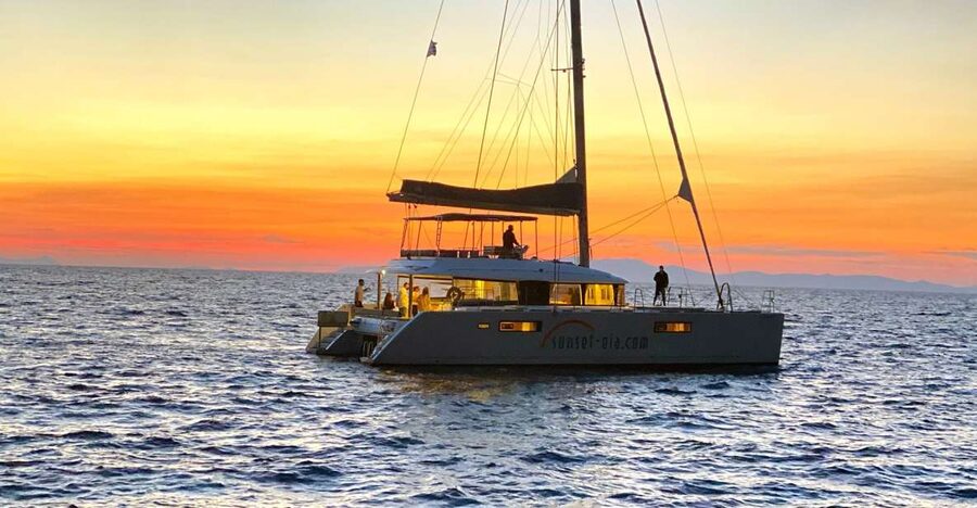Santorini: Luxurious Catamaran Cruise with Meal & Open Bar - Red Beach and White Beach from the water