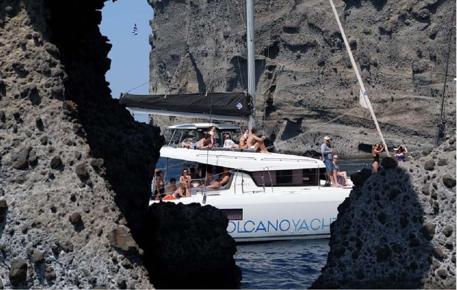 Santorini: Luxury Caldera Cruise With Meal & Drinks - Snorkeling among fish in the Aegean