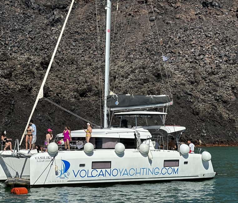 Santorini: Luxury Caldera Cruise With Meal & Drinks - Pickup, minibus transfer, and the start of the sailing